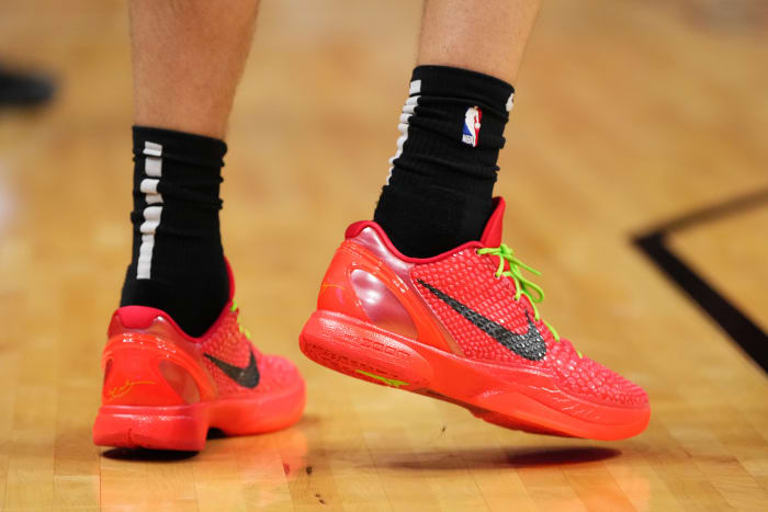 Kobe Bryant's red and black Nike sneakers.